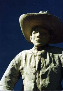 [Photo: Cowboy Statue on Boot Hill, Dodge City.]