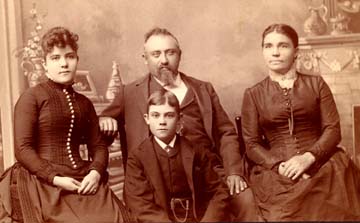 [Photograph of John and Karoline Mueller, with children Emelia and
Henry. Circa 1885. All rights reserved, FCHS.]