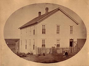 [Charles and Carrie Rath
House, 1877, faced east on Bridge St (2nd Ave.), Dodge City.  Boot Hill is
seen back and to the left of the house.]