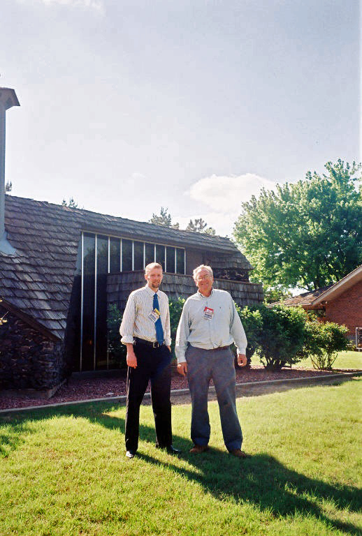 Kent Salisbury and George Laughead Jr. outside east side of Bruce Goff house.